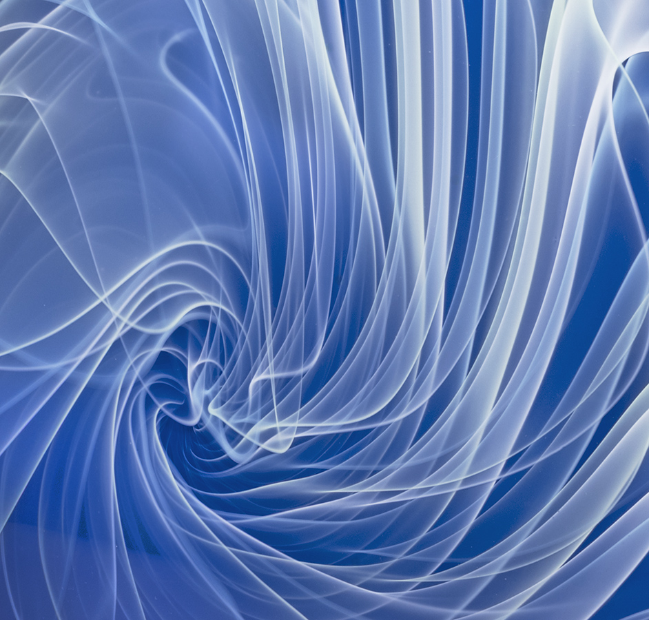 white and light green swirls on blue glass detail 